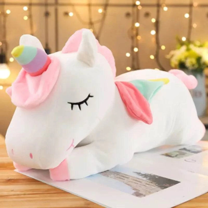 Whimsical huge unicorn in white and pink, designed to enhance your Christmas decorations with its soft colors and cuddly charm